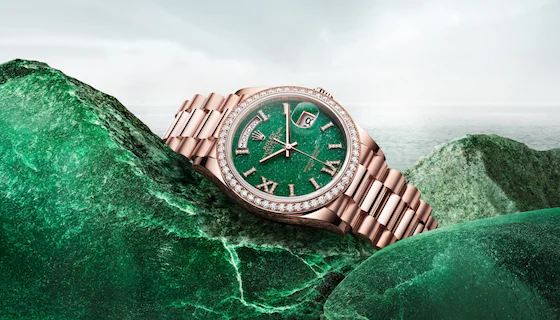 Rolex Replicas: Reimagining an Icon Without the Price Tag 1 Photo of green rolex on green background